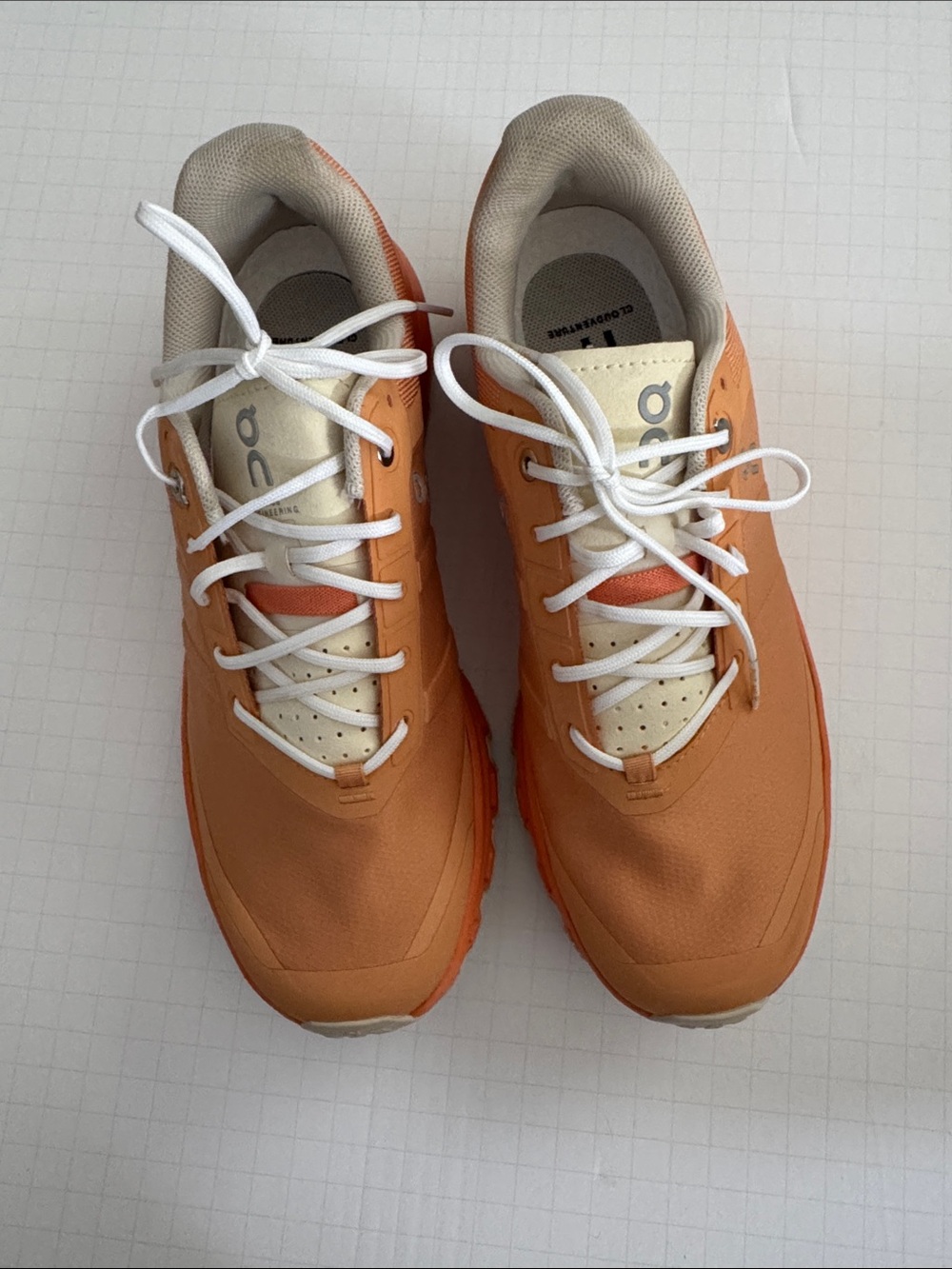 On Running Orange and Cream Trail Running Shoes